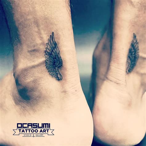 greek hermes wings tattoo.